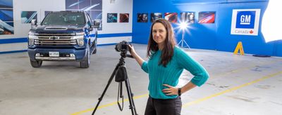 Amy Hibbert photographing team headshots on location
